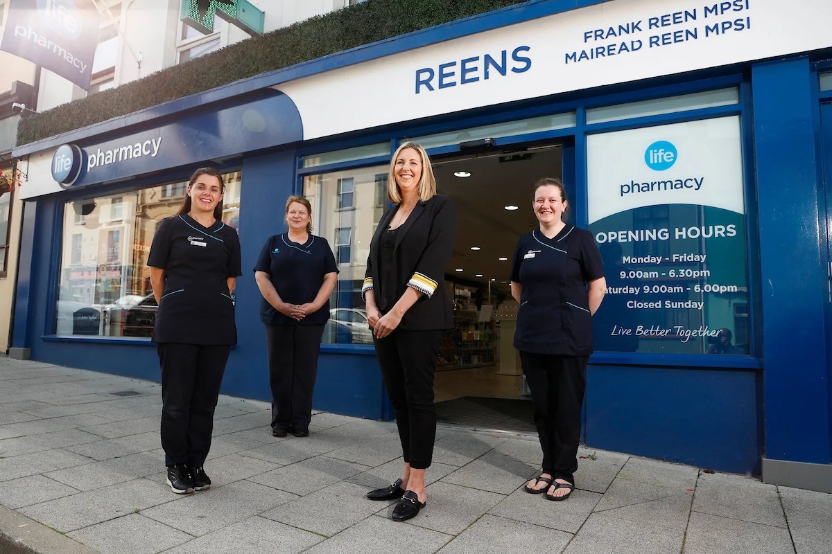 Louise Lally with the Reens Pharmacy team outside the shop